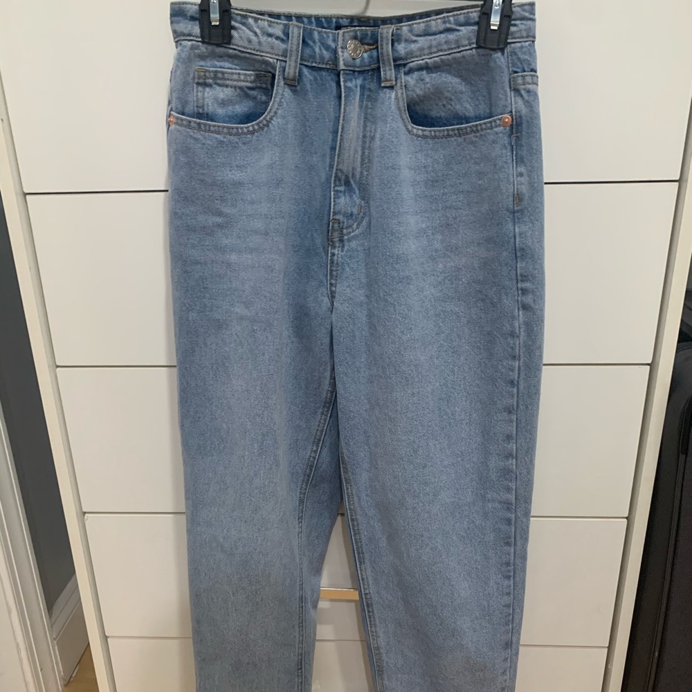 Mom jeans with bum rip